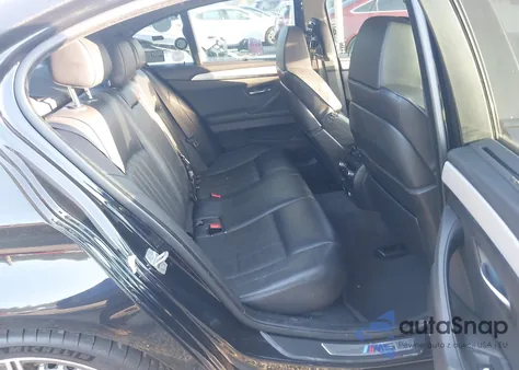 2015 BMW M5 z USA, uszkodzony, nr VIN WBSFV9C57FD595009